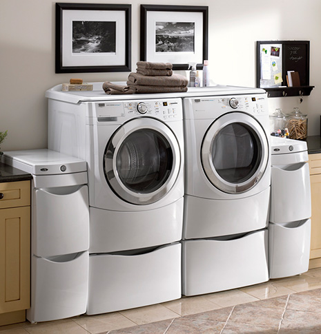 Essential Appliance, Inc.- Washer and Dryer set in a Laundry Room